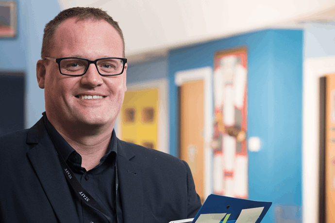 Phil Burton saves money on school staffing
